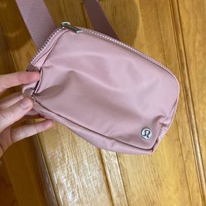 Light pink lululemon belt bag